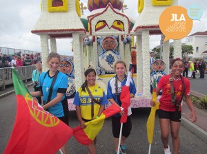 English school in Jersey takes part in Battle of Flowers.